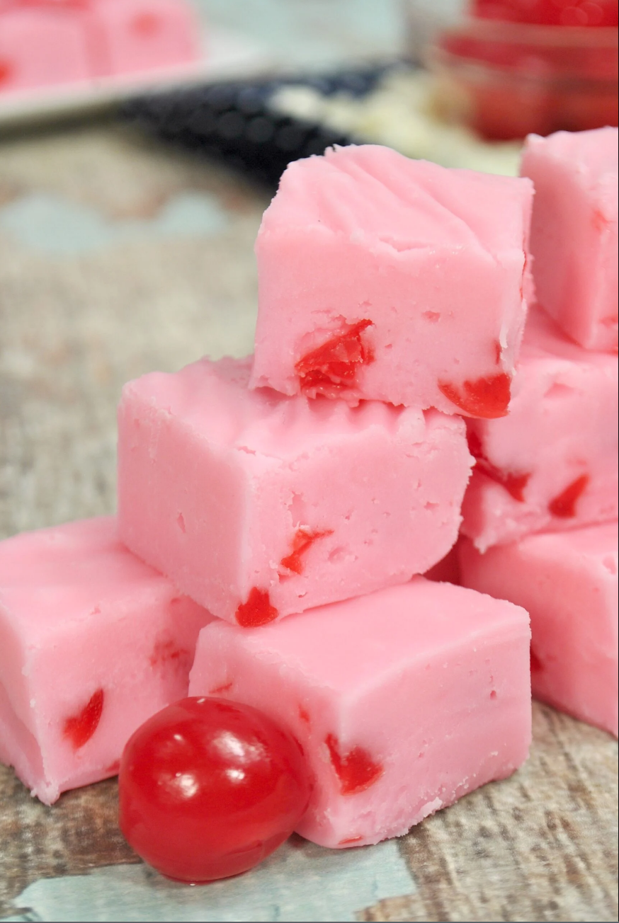 Valentine's Day Creamy Cherry Fudge: A heart-shaped fudge square adorned with maraschino cherries.