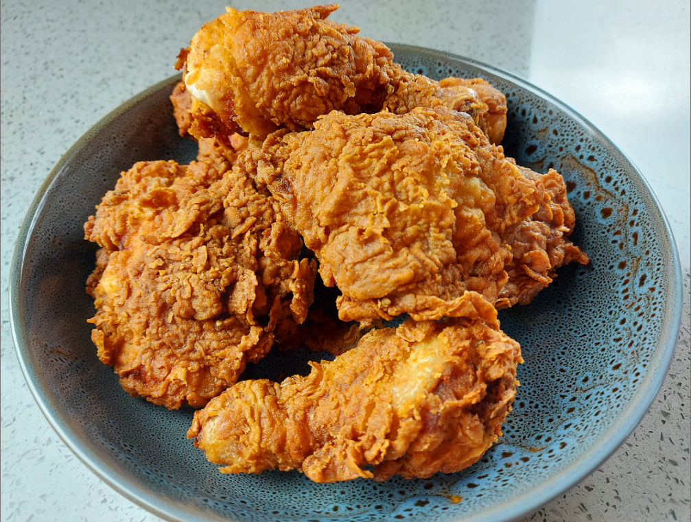 Homemade KFC Chicken - Golden, crispy pieces of chicken ready to tantalize your taste buds