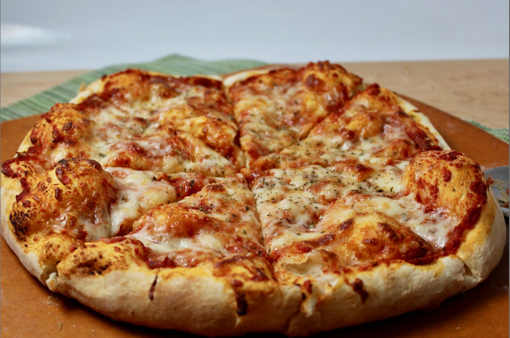 "Homemade Pizza Dough - Freshly made dough ready to be transformed into a delicious homemade pizza."