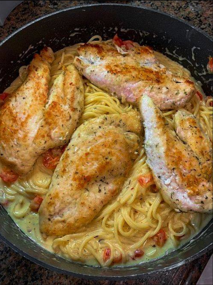 "Italian Chicken Pasta - A tantalizing dish featuring tender chicken, rich sauce, and perfectly cooked spaghetti."