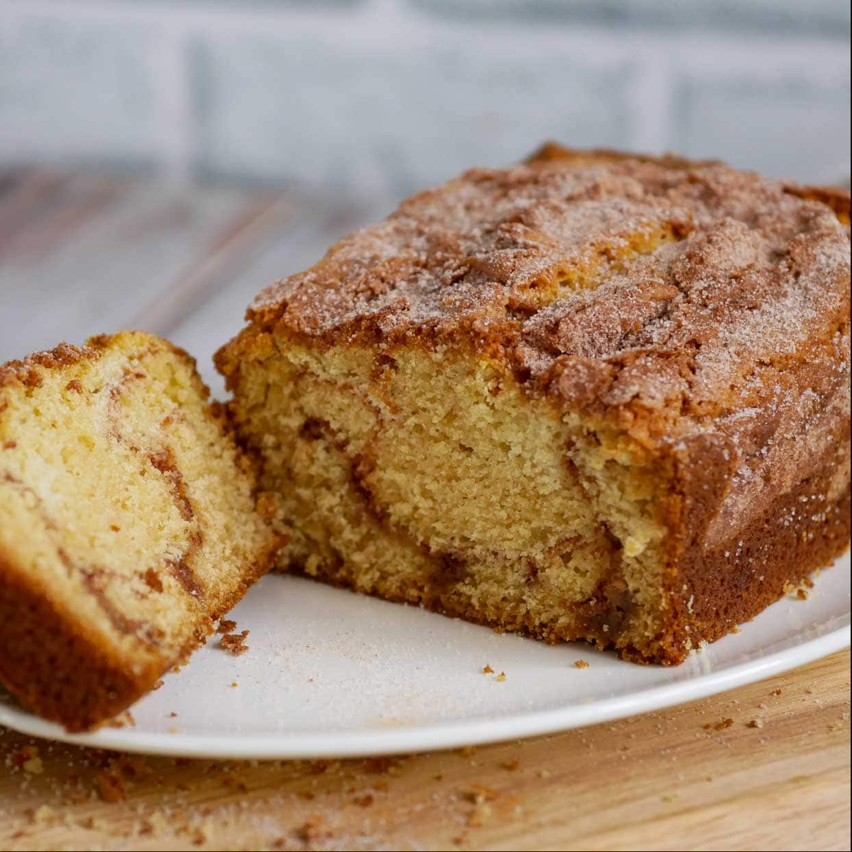 "Delicious Amish Cinnamon Bread with a marbled cinnamon-sugar swirl, fresh from the oven."