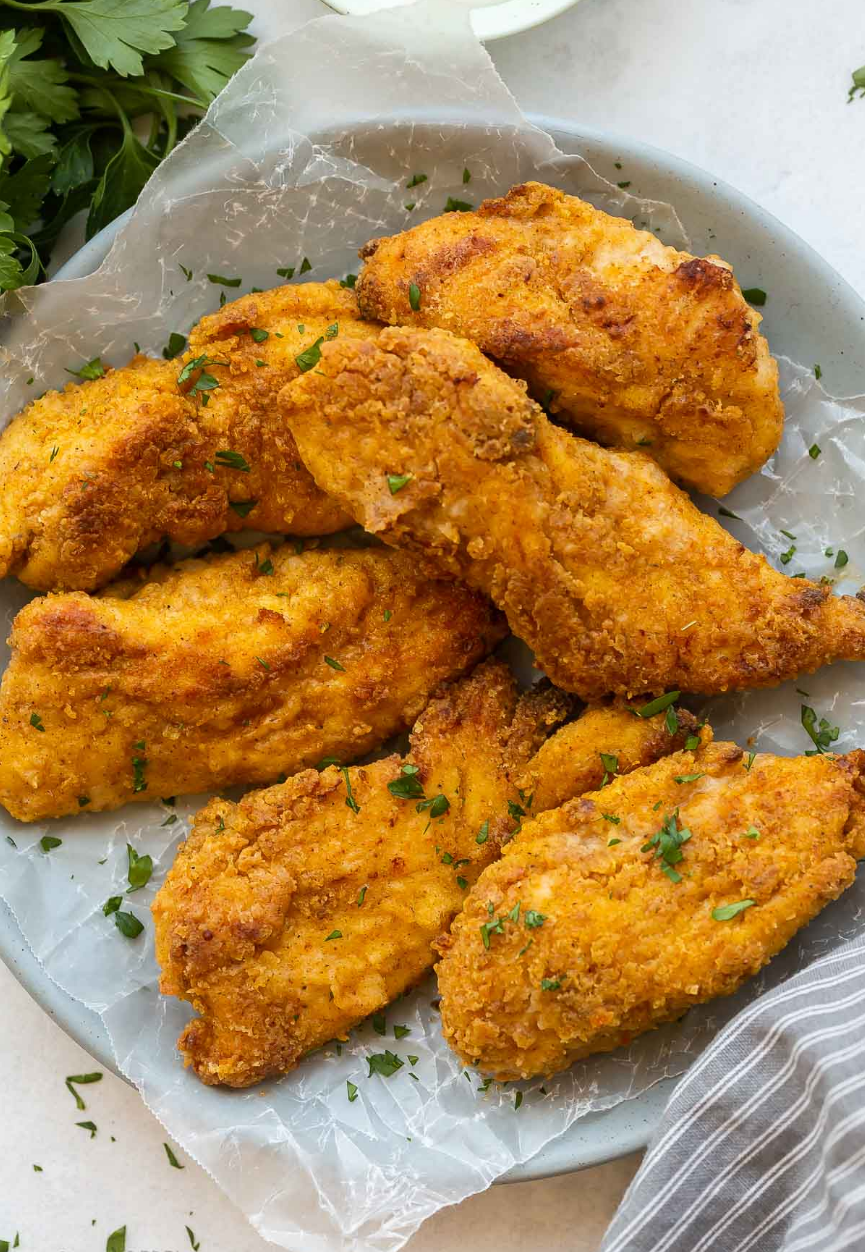 "Golden-brown Crunchy Baked Chicken 'Fried' Chic on a plate, crispy and inviting."