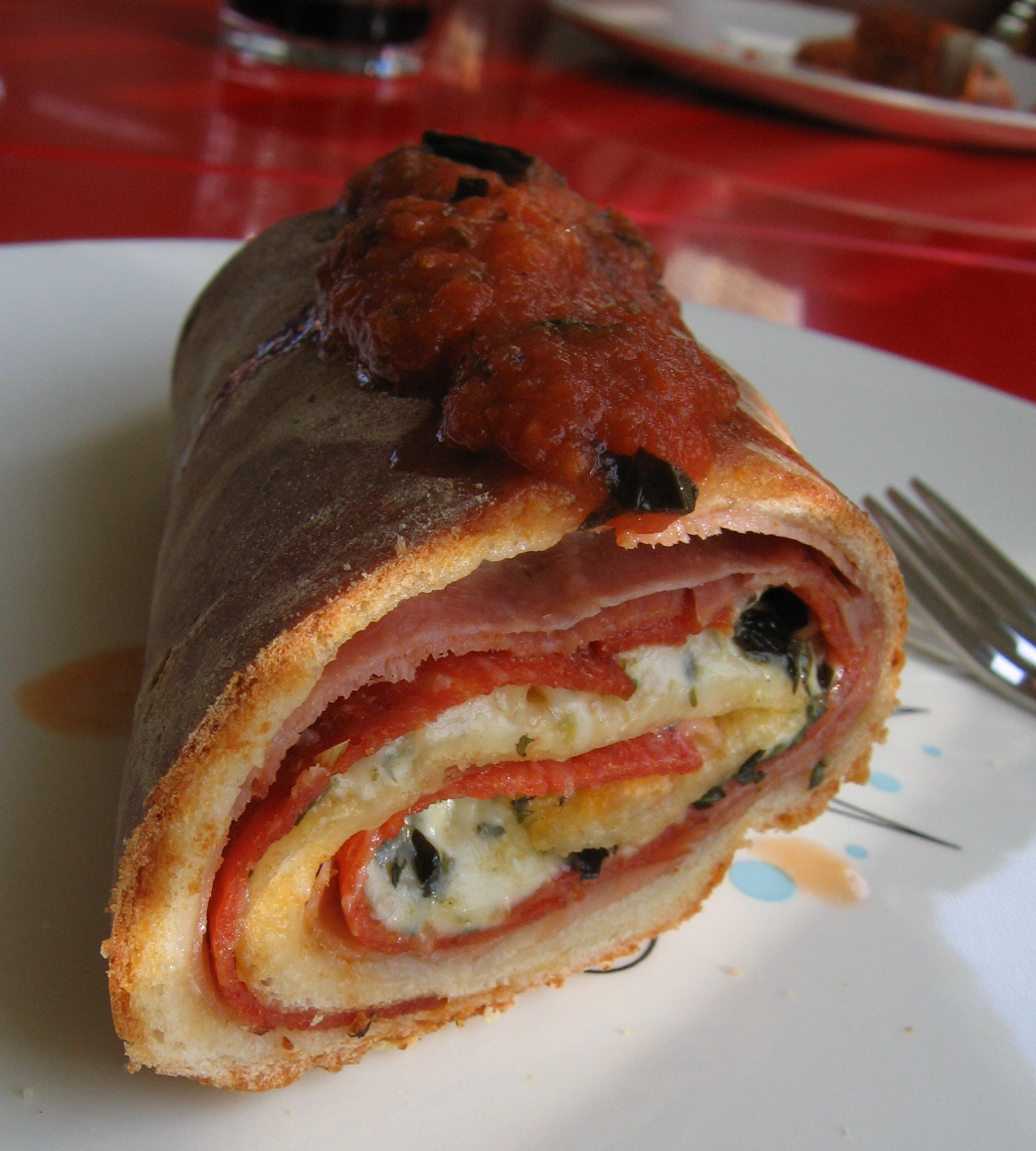 "Delectable Stromboli Roll: A Feast for Pizza Lovers"