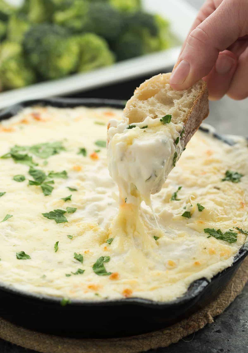 Cheesy Chicken Alfredo Dip - A bubbling, golden-brown dip with creamy Alfredo sauce, shredded chicken, and melted mozzarella cheese.