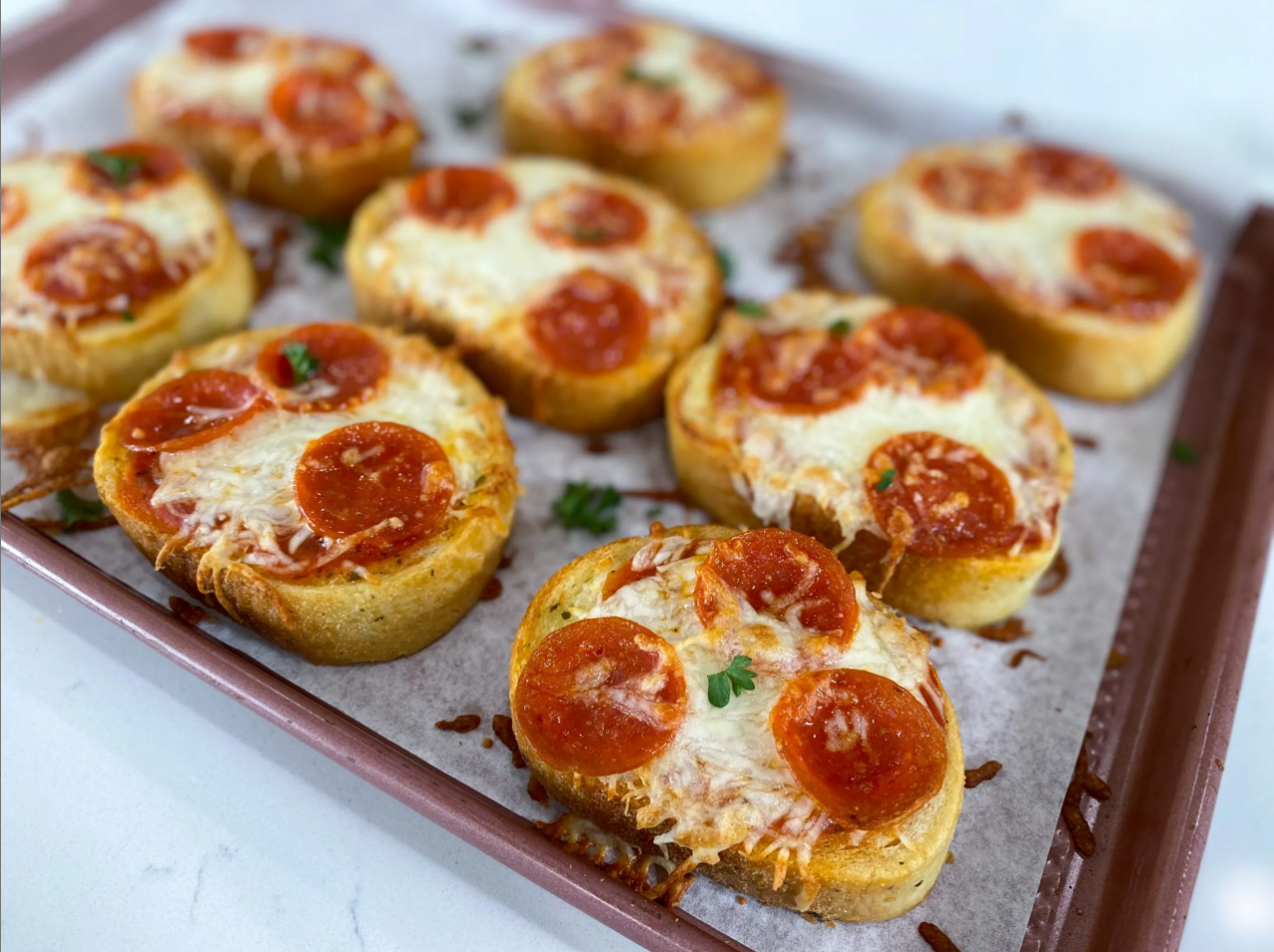 Texas Toast Supreme Pizza Melts - A mouthwatering combination of garlic Texas Toast, melted cheese, and assorted toppings.