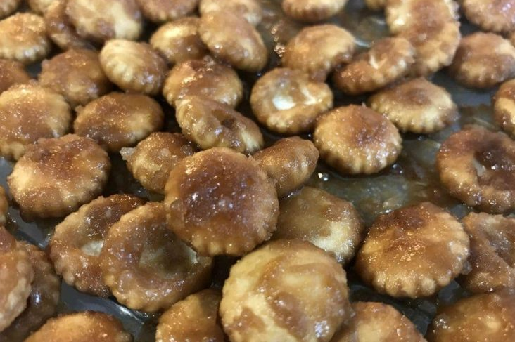 Salted Caramel Cracker Bites - A mouthwatering blend of oyster crackers coated in rich caramel, topped with a sprinkle of salt.