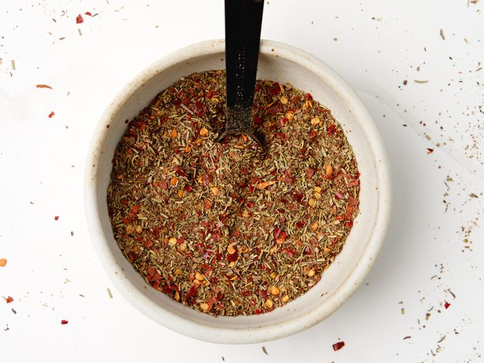 Italian Seasoning - Aromatic blend of dried basil, oregano, thyme, rosemary, marjoram, sage, parsley, and spices in a DIY mix.