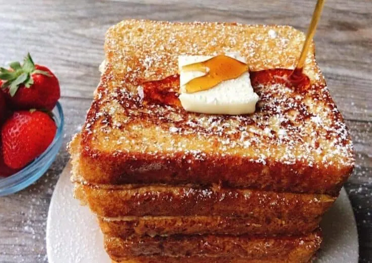 Plate of Perfect French Toast with a drizzle of maple syrup