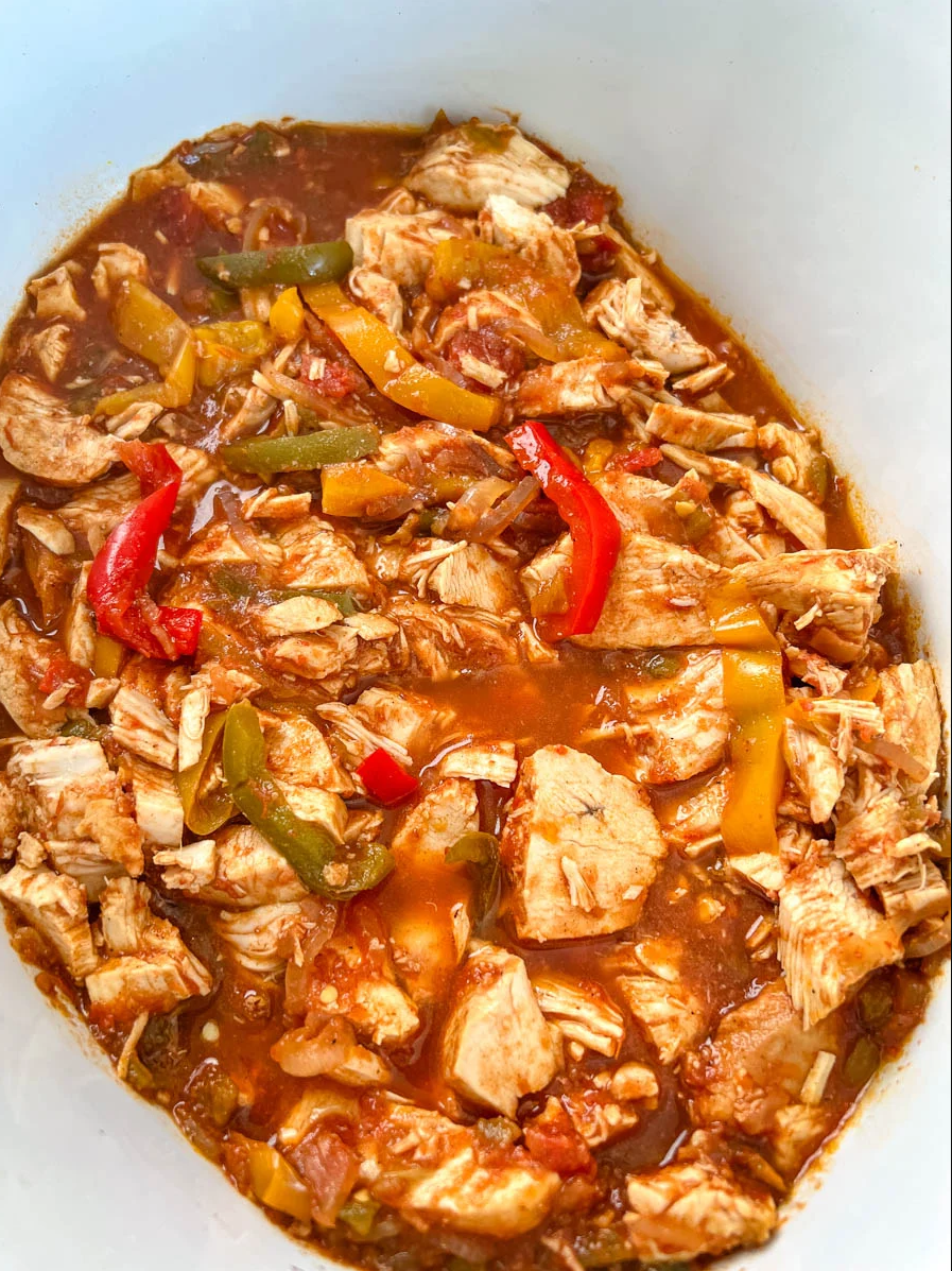 Slow Cooker Chicken Fajitas - A colorful dish featuring tender chicken, bell peppers, onions, and a burst of Mexican flavors.