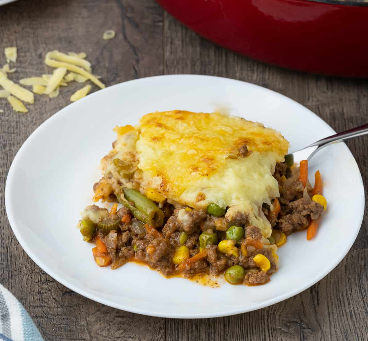 Shepherd’s Pie – A delectable combination of seasoned ground beef, creamy mashed potatoes, and mixed vegetables, baked to perfection.