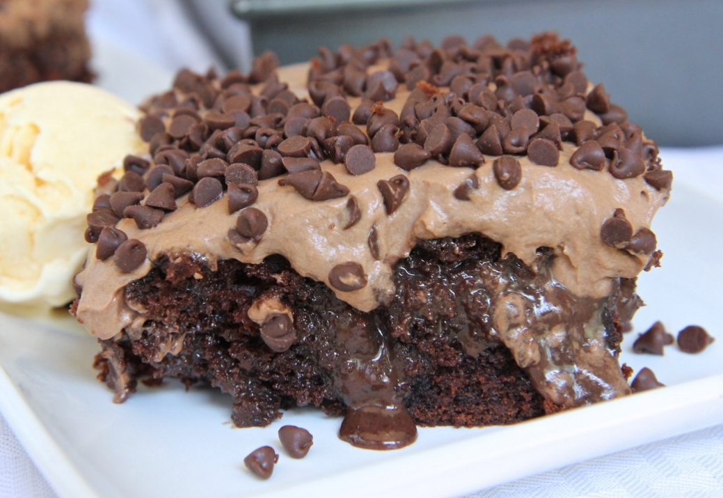 Chocolate Poke Cake – Moist chocolate cake filled with sweetened condensed milk and chocolate syrup, topped with chocolate ganache, whipped cream, and chocolate shavings.