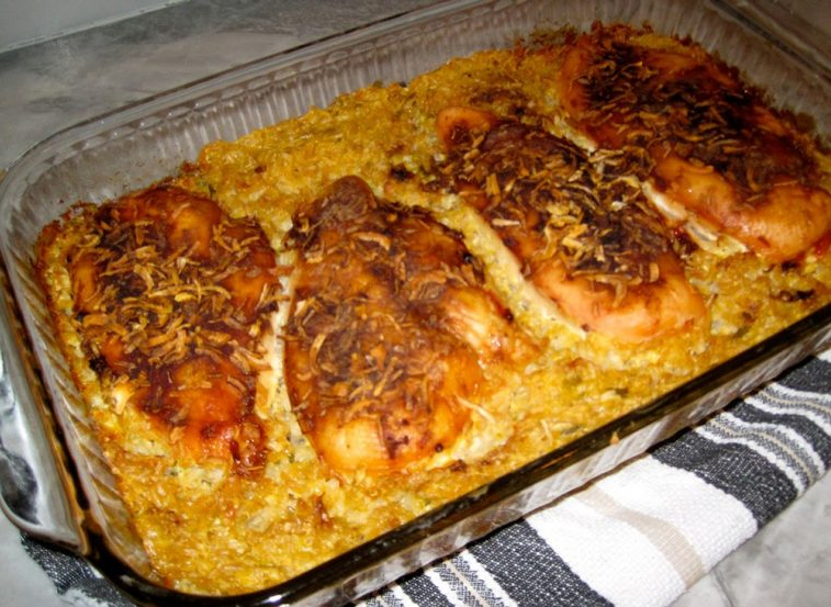 Amazing Forgotten Chicken – A tantalizing one-pan dish featuring tender chicken breasts on a bed of creamy rice, topped with Lipton onion soup mix.